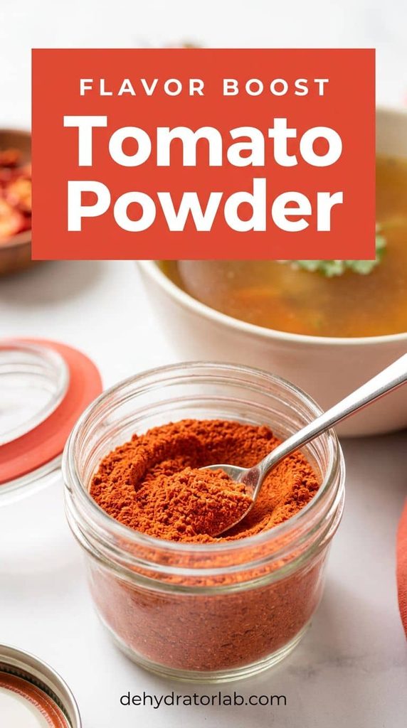 A small jar of dehydrated tomato powder next to a bowl of rich broth